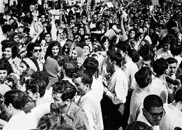A crowd protests the 1953 coup in Iran