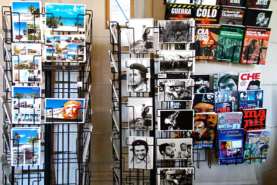 A photo of racks of touristic postcards and magazines in Cuba