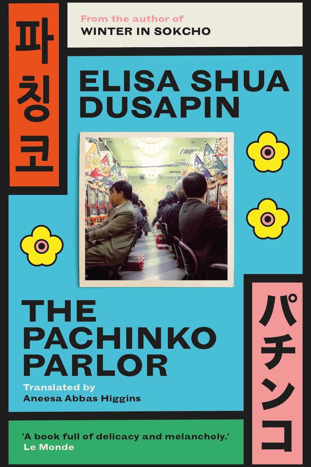 book cover image for elisa shua dusapin novel the pachinko parlor with janapnese text, yellow flowers against sea blue background and a central image of a pachinko parlor